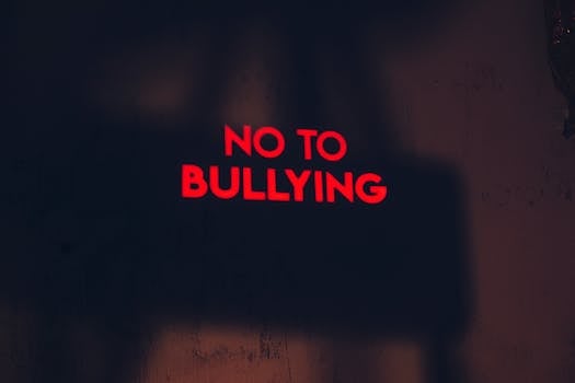 A compelling image with the message 'No to Bullying' in bold red text on a dark background.